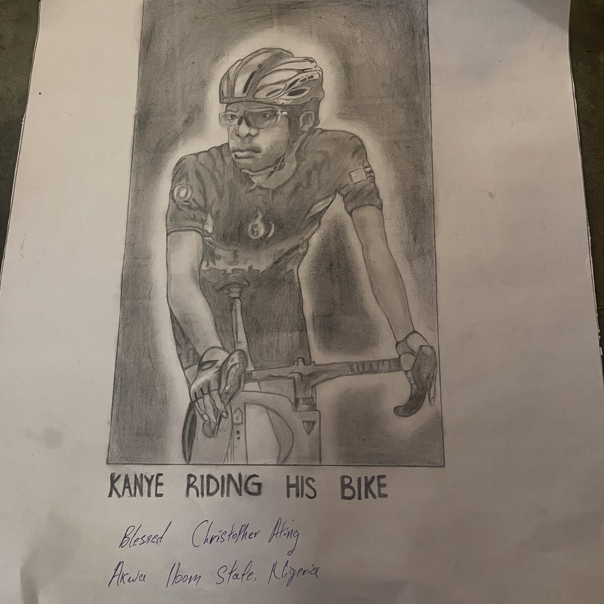 Blessed Christopher Ating, Kanye Riding His Bike.